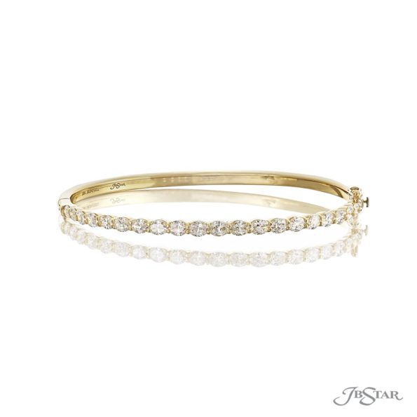 Diamond oval bangle in 18KY gold