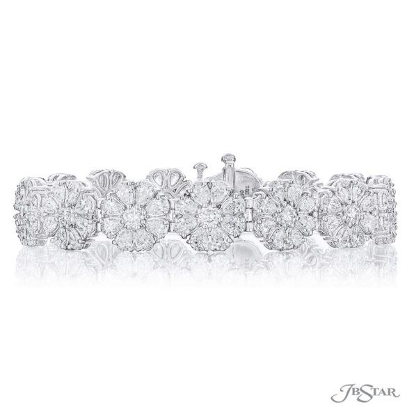 Pear shaped and round diamond bracelet floral design