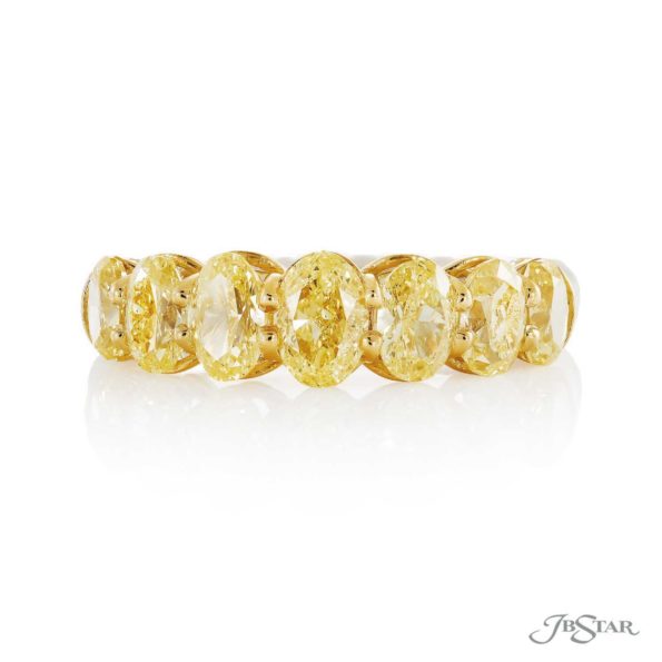 Elegance Elevated: Classic Single-Row Fancy Yellow Oval-Cut Diamond Band in 18k Yellow Gold and Platinum